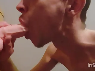 Gay Twink Joe Nuts giving his avant-garde dildo a blowjob